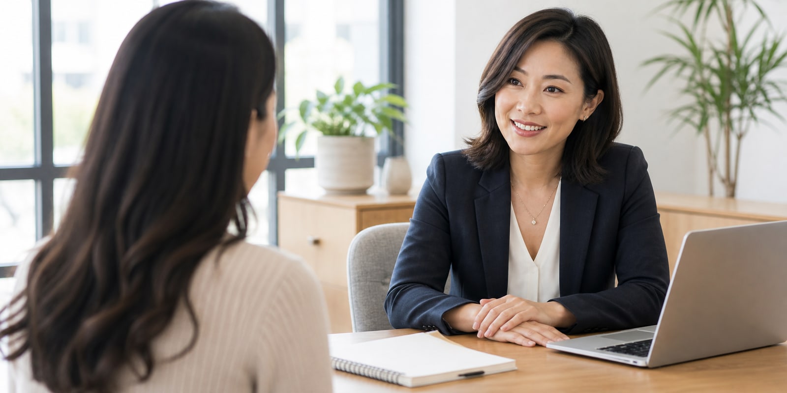 A bilingual lending advisor speaking with a client