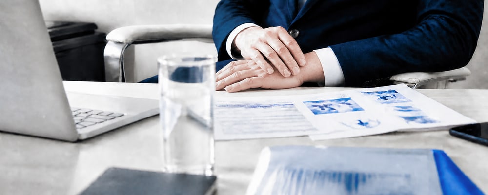 A lending advisor reviewing mortgage information